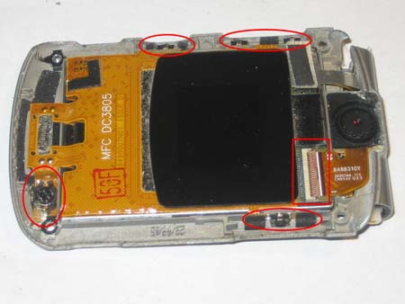 Carefully pry away the circuit from the plastic near all buttons and the backup battery